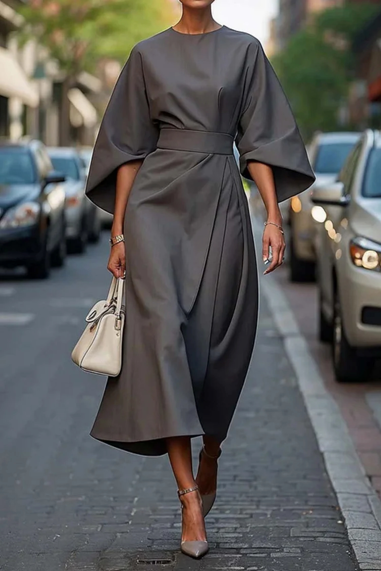 Sofía - elegante vestido con mangas abullonadas y cinturón.